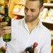man buying wine