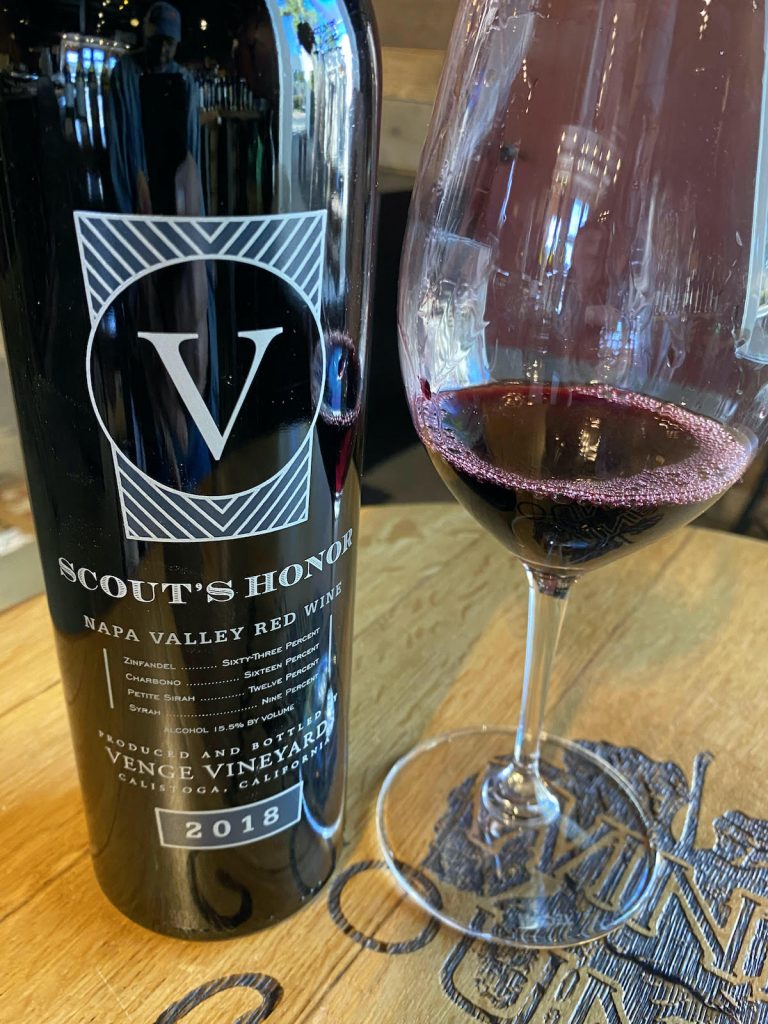 alt="Venge Vineyards Scout's Honor Red Wine bottle and glass"