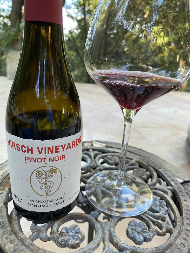 alt="Hirsch Vineyards 2017 San Andreas Fault Pinot Noir bottle and glass"