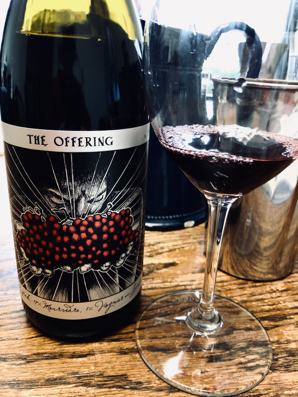 alt="Sans Liege 2018 The Offering bottle and glass"