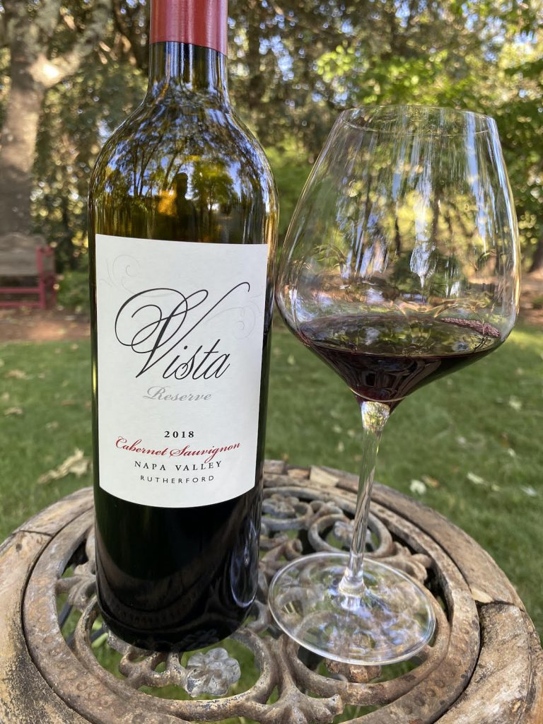 alt="Vista 2018 Reserve Rutherford Cabernet Sauvignon bottle and glass"