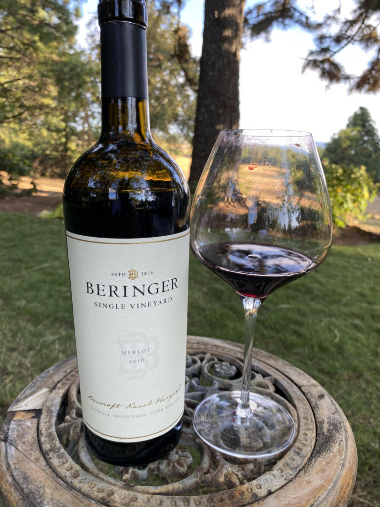 alt="Beringer 2016 Merlot Bancroft Ranch Vineyard bottle and glass"