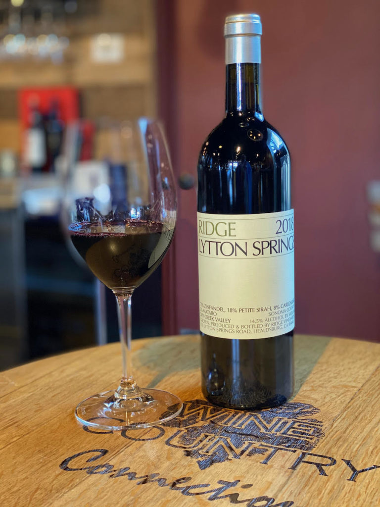 alt="Ridge Vineyards 2018 Lytton Springs bottle and glass"