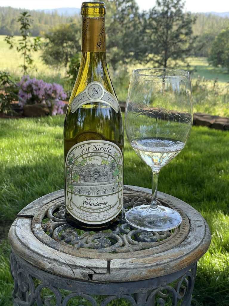 alt="Far Niente 2019 Napa Valley Chardonnay bottle and glass"