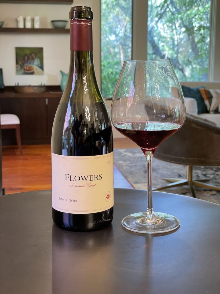 alt="Flowers Sonoma Coast Pinot Noir bottle and glass"