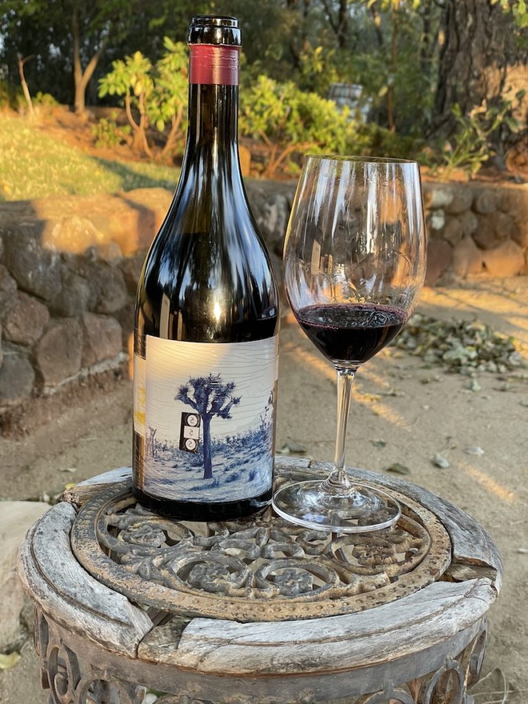alt="Orin Swift 8 Years in the Desert Red Wine bottle and glass"