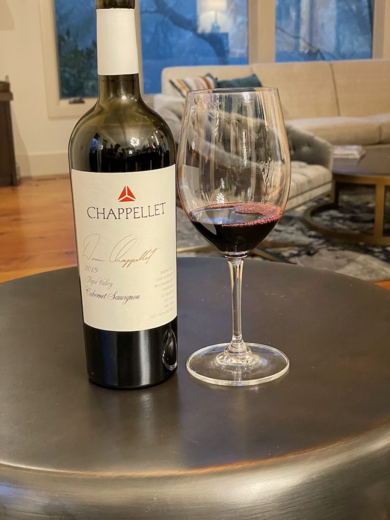 alt="Chappellet Signature Cabernet Sauvignon bottle and glass"