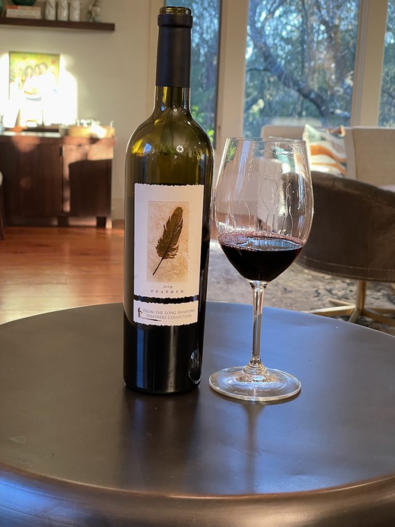 alt="Feather Columbia Valley Cabernet Sauvignon bottle and glass"