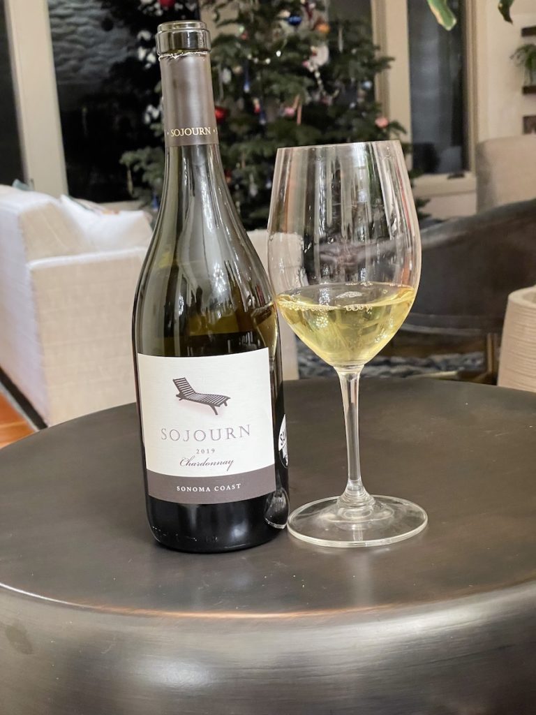 alt="Sojourn Sonoma Coast Chardonnay bottle and glass"