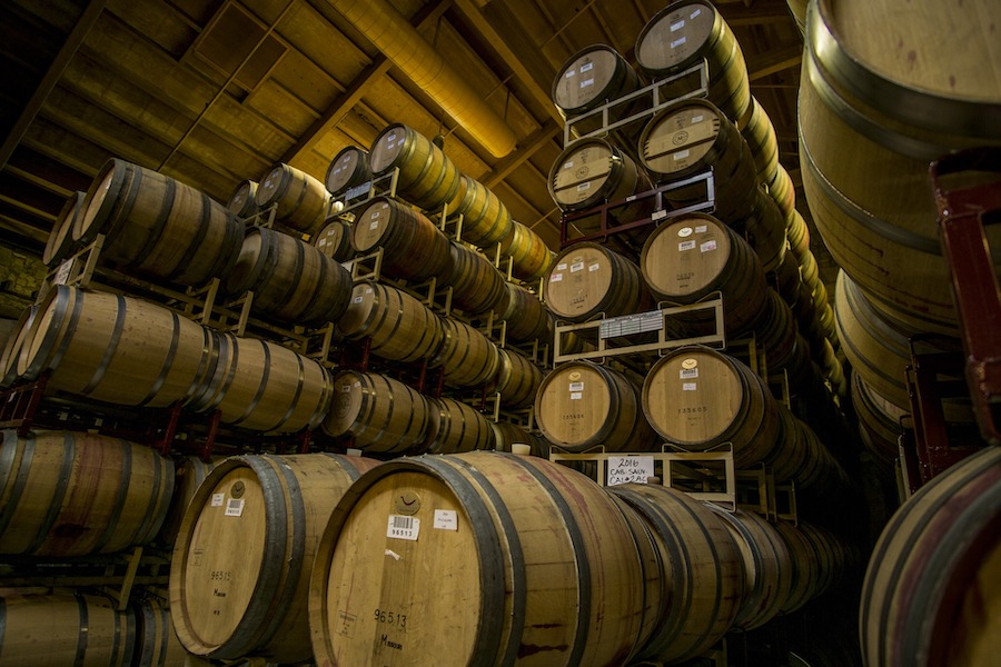 alt="winer barrels stacked"