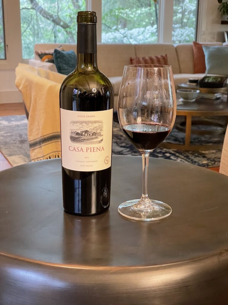 alt="Casa Piena Estate Grown Napa Valley Caberne Sauvignon bottle and glass"
