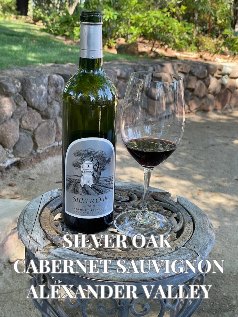 alt="Silver Oak Alexander Valley Cabernet Sauvignon bottle and glass"