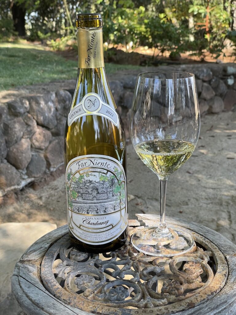 alt="Far Niente Napa Valley Chardonnay bottle and glass"