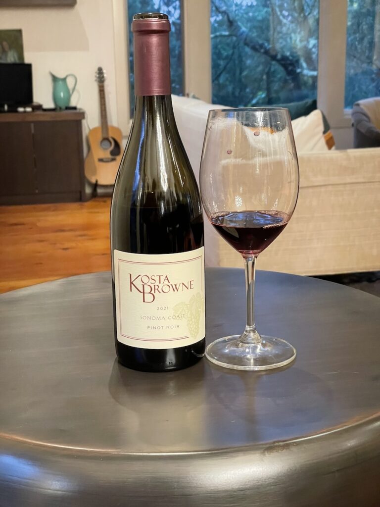 alt="Kosta Browne Sonoma Coast Pinot Noir bottle and glass"