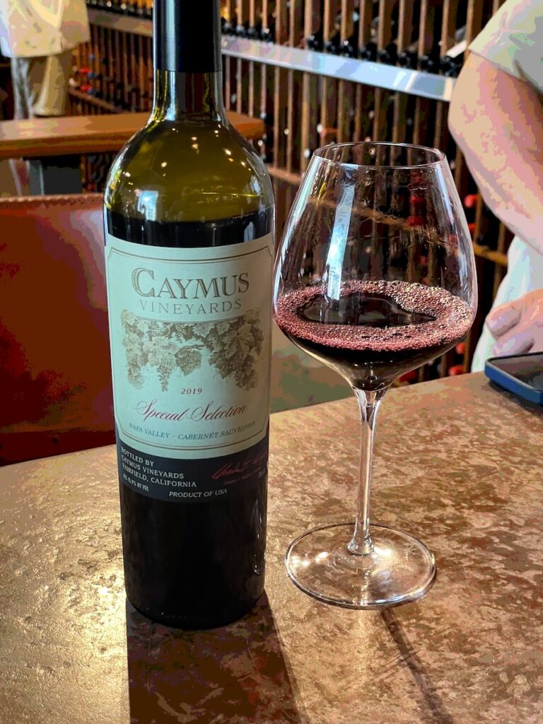 Caymus Special Selection Cabernet Sauvignon bottle and glass