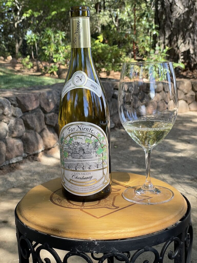 alt="Far Niente Napa Valley Chardonnay bottle and glass"